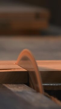 Skillful Carpenter Precisely Measuring And Guiding Final Trim With Diligent Attention To Detail. Media