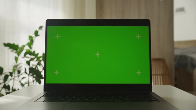 Laptop green screen mockup with dolly zoom