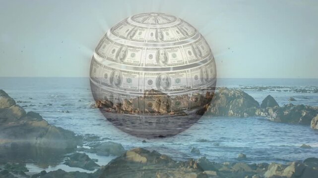 Finance dollar sphere descending from horizon over rocky shore, revealing sea through clear shell