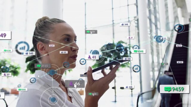 Woman raising phone speaking in tech lobby making chat bubbles around mic for live network feedback
