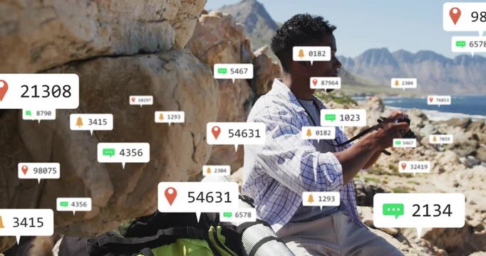 Incoming pins and badges appearing, man raising camera and shooting coastline for travel