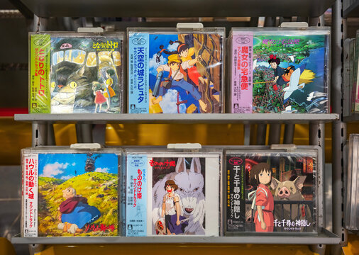 tokyo, shibuya - sep 12 2025: Japanese Studio Ghibli anime soundtrack CDs like Spirited Away and My Neighbor Totoro are displayed on a shelf, highlighting iconic pop culture music at a retail shop.