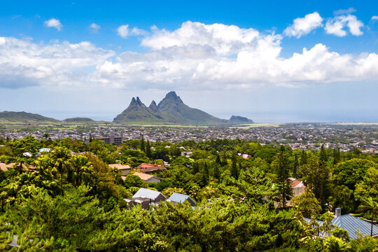 The viewpoint at Trou aux Cerfs, an extinct volcano in Mauritius, offers 360-degree panoramic views of the town of Curepipe, the surrounding residential areas, and the green mountain landscapes
