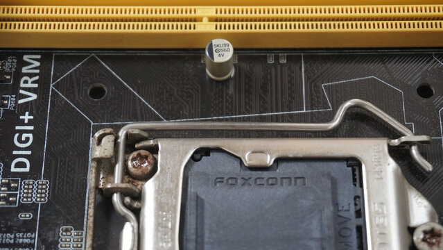 Purwokerto, Indonesia - 17 March 2026: Close-up of a computer motherboard CPU socket with Foxconn branding.