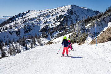 skiing in the mountains