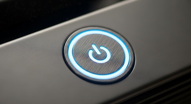 Glowing Blue Power Button on Modern Electronic Device | On/Off Control