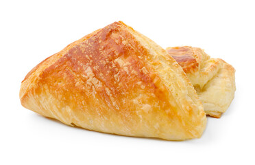 Tasty baked puff pastries isolated on white