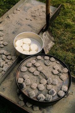 Santa Fe, New Mexico, USA. Chile and bisquits baking in cowboy coal fired pots.