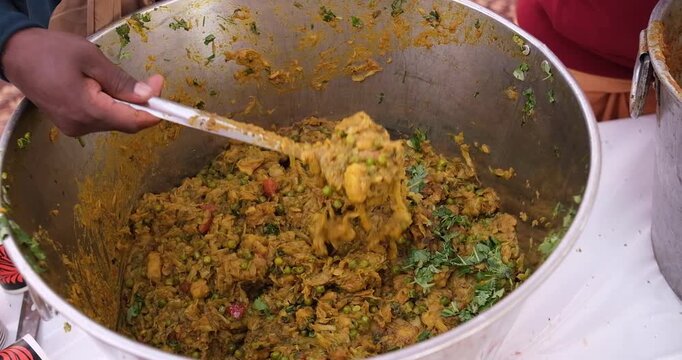Hindu Devotees Sharing Spiritual Food at Mahakala Festival in India