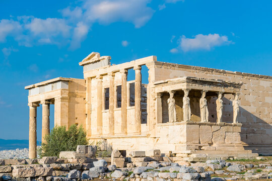 Sunny panoramic view of The Erechtheion or Temple of Athena Polias, ancient Greek Ionic temple on the north side of the Acropolis, Athens, Greece