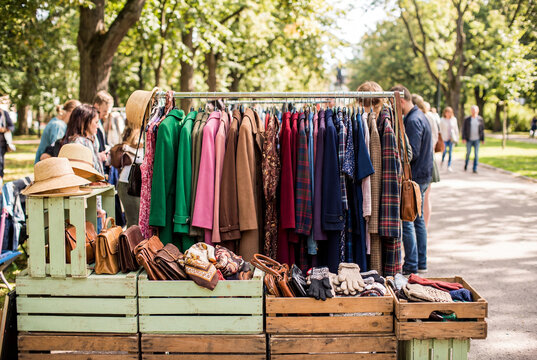 Vintage clothes rack at an outdoor flea market stall