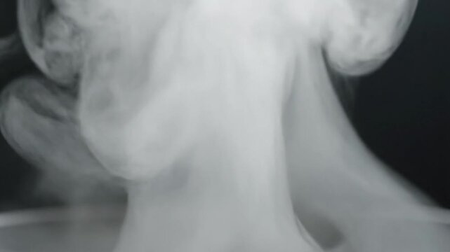 Smoke swirling in dark background.