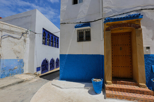 blue and white architecture, traditional wooden door and blue and white architecture in rabat morocco