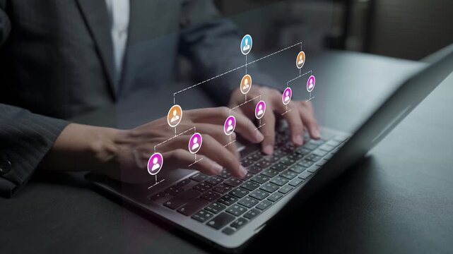 Business corporate hierarchy structure concept. Person using laptop with team structure and management level icons, organizational chart, leadership framework and corporate organization.