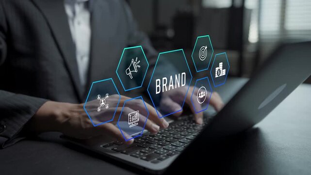 Business branding strategy concept. Person typing keyboard with brand management and marketing icons, brand positioning, identity design and marketing communication.