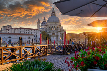 Canal Grande with Venice gondola and Basilica di Santa Maria della Salute in Venice, Italy. Architecture and landmarks of Venice. Venice postcard © Ekaterina Belova