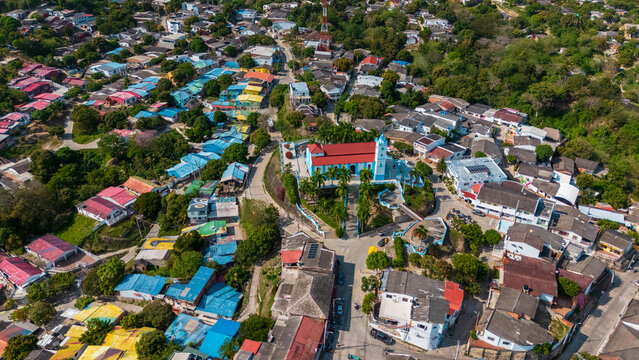 Aerial View of the Church of Usiacur&iacute; on Hilltop Surrounded by Colorful Town &ndash; Atl&aacute;ntico, Colombia