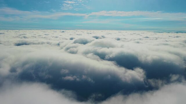 Scenic view of beyond distant horizon in air in a clear blue sky