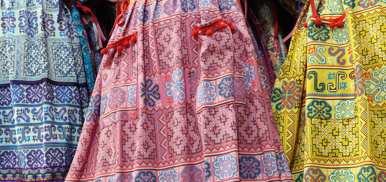 Colorful Traditional Tribal Textile Shirts Hanging in Market