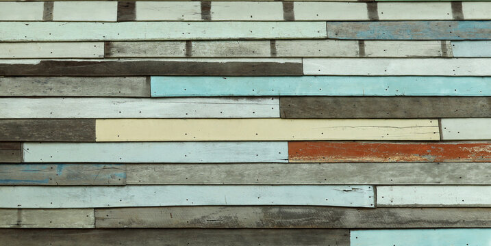 Colorful wooden wall made of boards. Vintage background backdrop