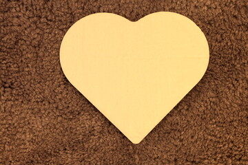 Large heart on fluffy wool background. © Martin of Sweden