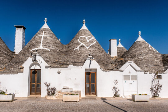 Trulli houses and streets in Alberobello, a small town in the south of Italy. Part of the UNESCO world heritage site since 1996. A trullo house is a traditional dry stone hut with a conical roof