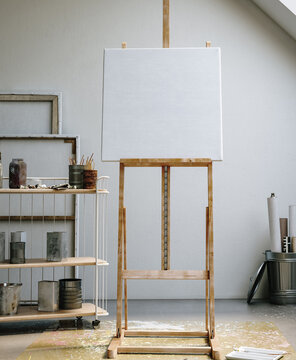 Square Canvas Mockup in Industrial Loft Art Studio, Scandinavian Interior, 3D Render
