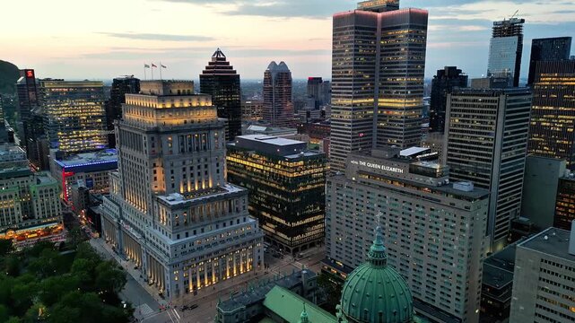 Aerial view of downtown Montreal at blue hour featuring Sun Life Building and city skyline, Quebec, Canada