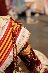 Naklejka premium Fallera costume details at Las Fallas festival in Valencia
