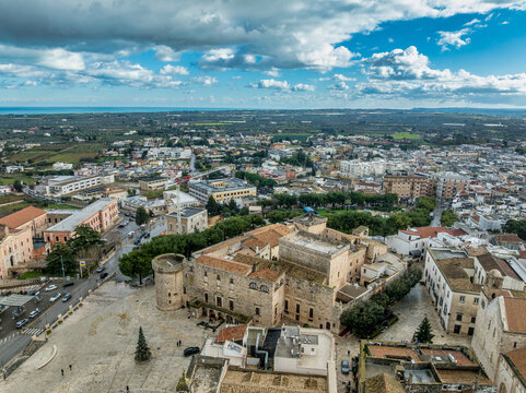 Discover Conversano: Arial view Pugliese Gem featuring the Acquaviva Castle, Stone-Carved Cathedral, Ancient Medieval Alleys near Bari, Italy