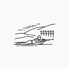 Fototapeta premium Biathlete aiming at targets while lying on the ground in winter landscape 