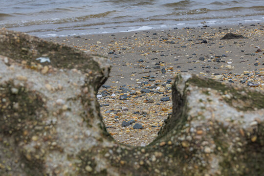 Sandy Hook Beach Viewed Through Gap in Weathered Concrete Structure New Jersey