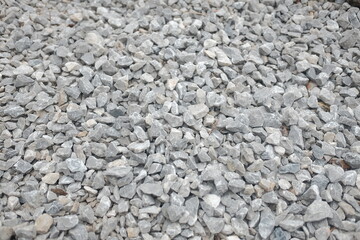 Crushed gray gravel stones close-up texture