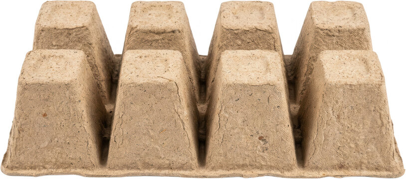 An eight compartment molded pulp tray with a ridged texture and natural fiber details presenting a raw and earthy aesthetic cardboard tray packaging fiber tray egg carton transparent background