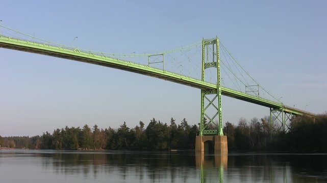 Thousand Islands Bridge detail. Green suspension bridge over Saint Lawrence river. HD video. 