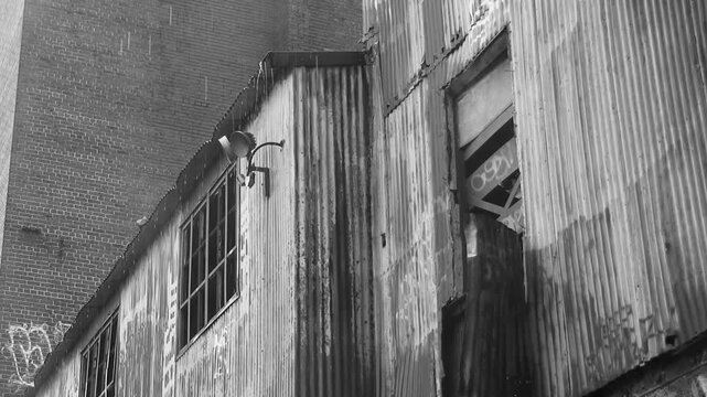 Abandoned factory with heavy rain. Black and white. Good audio.