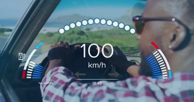 Driver accelerating on coastal road, monitoring data while auto HUD updating speed and lights
