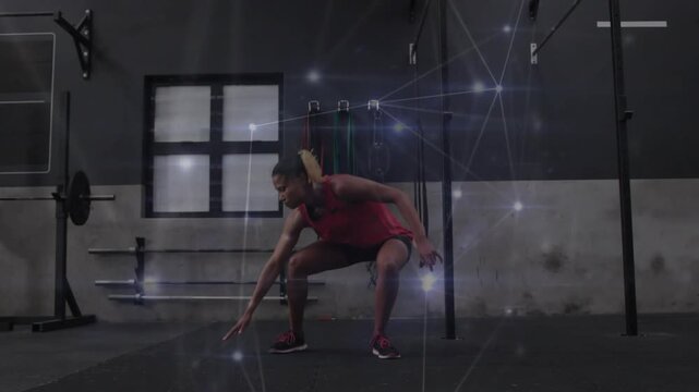 Woman running from right lowering into squat shuffling and sprinting out for fitness nodes tracking