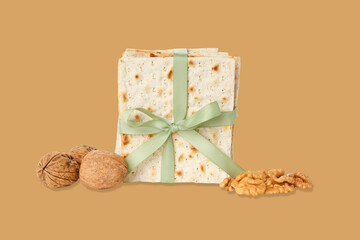 Fototapeta premium Traditional matzah with nuts and ribbon for Passover celebration