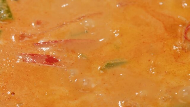 Tamarind red prawn curry cooking, shrimps in tomato ginger sauce, asian kitchen, Chinese restaurant.