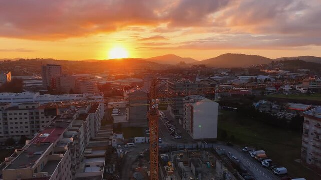 Construction crane at sunset in Braga, Portugal