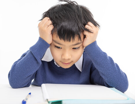 Frustrated  boy struggling with homework