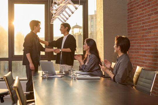 A team of business professionals working diligently in the office