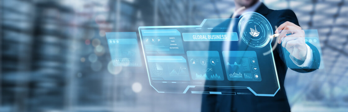 Businessman pointing at a digital screen and analyzing global business strategy, international market analytics, cross border trade insights, corporate globalization planning