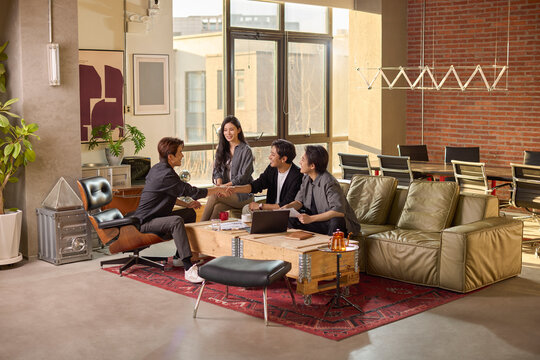 A team of business professionals working diligently in the office