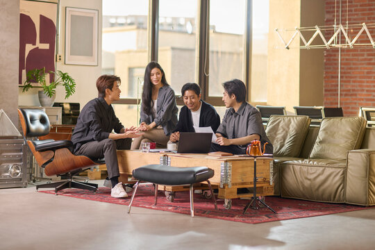 A team of business professionals working diligently in the office