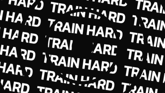 Rotating concentric text rings display the phrase train hard repeated along circular paths around a center space.