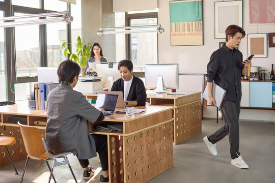 Office professionals engaged in focused work