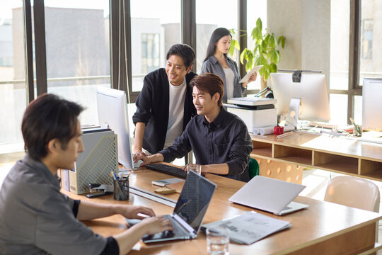 Office professionals engaged in focused work