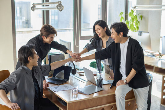 A team of business professionals working diligently in the office